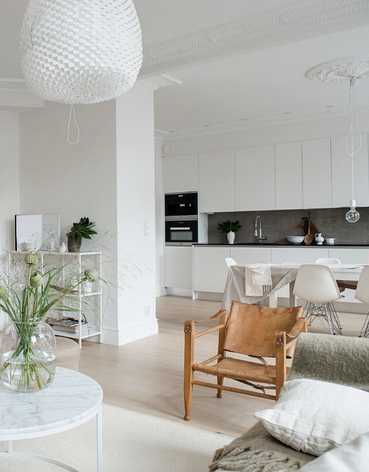 ideal home layout white living and leather chair - Hege in France 