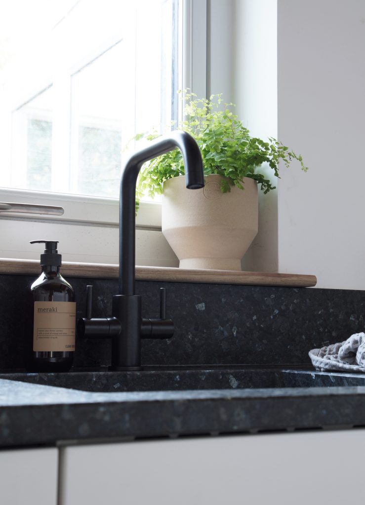 kitchen renovations lundhs natural stone worktops emerald silk black tap
