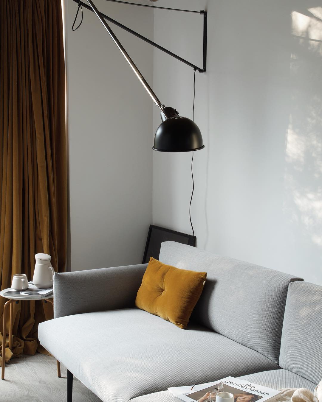 Nordic, minimalist home updates for the spring including mustard yellow curtains and spring blossom