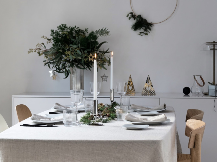 Christmas table setting using natural tones and Georg Jenson gold and silver Christmas ornaments