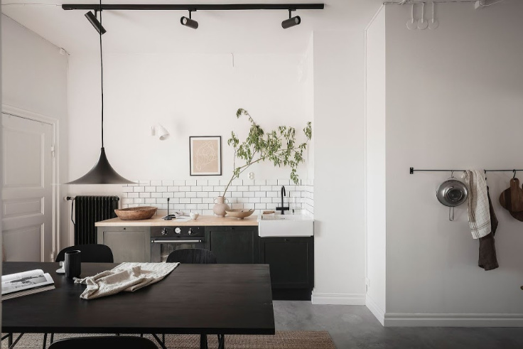 BLACK KITCHEN WITH TACTILE ART PIECES