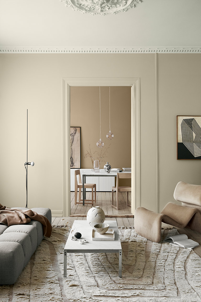 New neutral colours in a Nordic living room with Scandinavian designer furniture and accessories